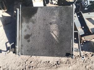 Radiador original para Sentra 2005