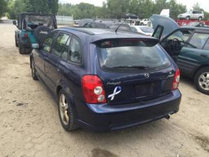 En Venta Medallones para Mazda Protege